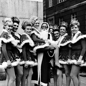 Sid James Comedy Actor Carry On Films collecting toys for charity at the Variety Club