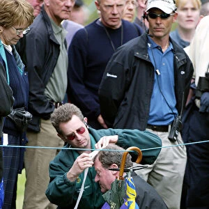 Spectator Is Treated After Struck By Golf Ball
