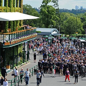 Wimbledon Crowds Led Past Centre Court