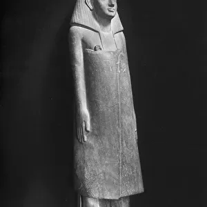 Statue of Imeri, prefect of Thebes, preserved in the Louvre Museum, Paris