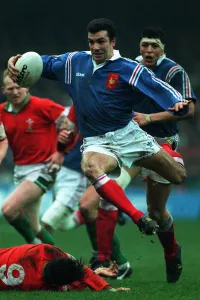 Alain Penaud Jumps Past A