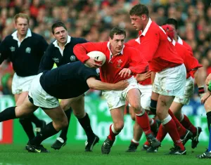 Weir Prints: Alan Batemans Tackled By Weir