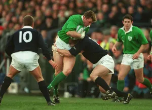 Holmes Prints: Denis Hickie Is Tackled By