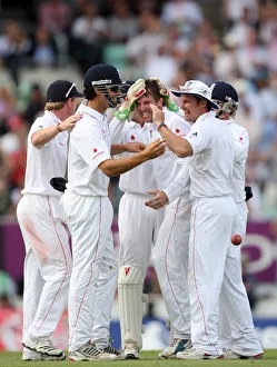 Wicket Prints: England Team Celebrate With Graeme Swann After Clark Wicket
