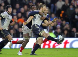 Fulgence Ouedraogo Challenges John Barclay As He Kicks Fulgence Ouedraogo Challenges John Barclay As He Kicks