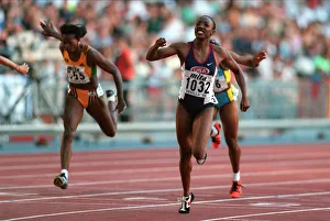 Seville Prints: Inger Miller Wins 200 Meters