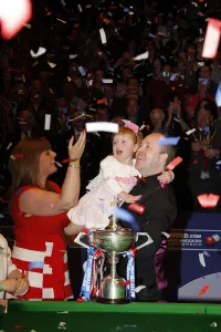 Champion Prints: John Higgins Celebrates With His Family