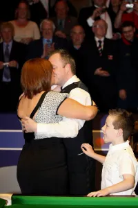 Champion Prints: John Higgins Is Congratulated By Wife & Denise
