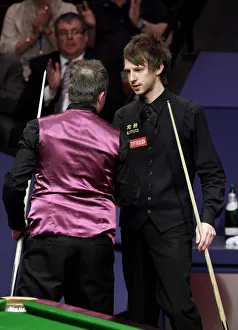 Champion Prints: John Higgins Consoles Judd Trump