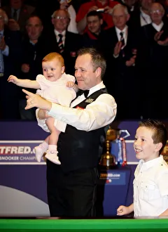 Champion Prints: John Higgins Holds Daughter