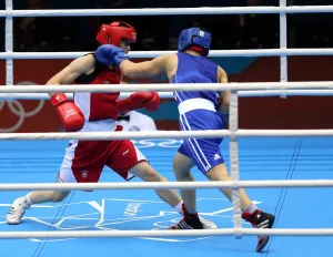 57 60kg Prints: Katie Taylor & Sofya Ochigava