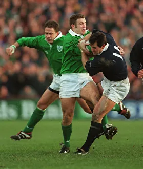 Kevin Prints: Kenny Logan Is Tackled By