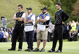 Westwood Prints: Lee Westwood & Martin Kaymer With Caddies After Halfing