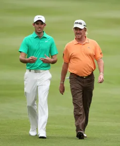 Miguel Angel Jimenez & Charl Schwartzel On The 12th Hole Miguel Angel Jimenez & Charl Schwartzel On The 12th Hole