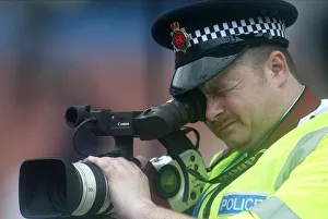 Trials Prints: Police Cameraman