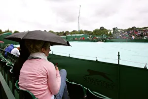 Genral View Prints: Rain Holds Up Play At Wimbledon