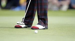 Red Tipped Golfers Shoes & Putter Red Tipped Golfers Shoes & Putter
