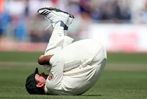 Ponting Prints: Ricky Ponting Stretches His Back