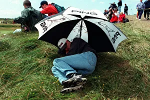 Spectator Takes Cover