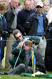 Spectator Prints: Spectator Is Treated After Struck By Golf Ball