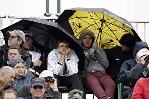 Georges Prints: Spectators Shelter In The Stands