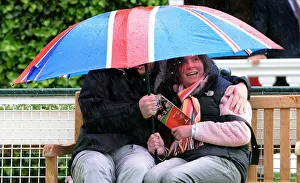 Dante Prints: Taking Shelter From Rain Under Union Jack Umbrella