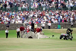 Walks Prints: Tiger Woods Walks Over The Swilken Bridge