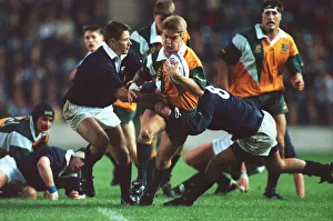 Past Prints: Tim Horan Breaks Past Peters