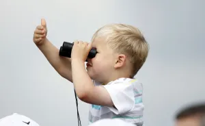 Young Prints: Young Spectator Tries Out Binoculars