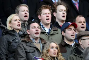 Prince Prints: Zara Phillips & Prince Harry During National Anthem