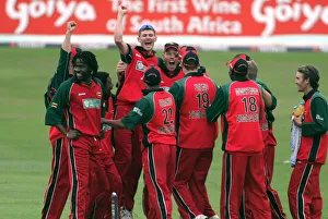 Wicket Prints: Zimbabwe Players Celebrate Wicket